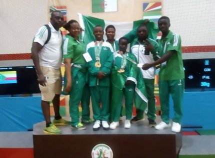 Team-Nigeria-weightlifter-receiving-medals