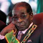 FILE PHOTO -  File photo of Zimbabwe's President Mugabe looking on during a rally marking Zimbabwe's 32nd independence anniversary celebrations in Harare